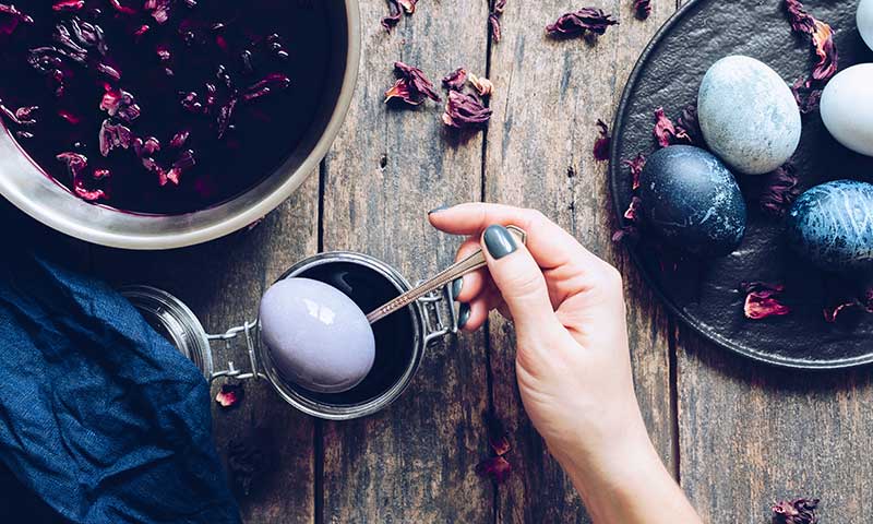 Naturally dyed eggs in various shades of blue.